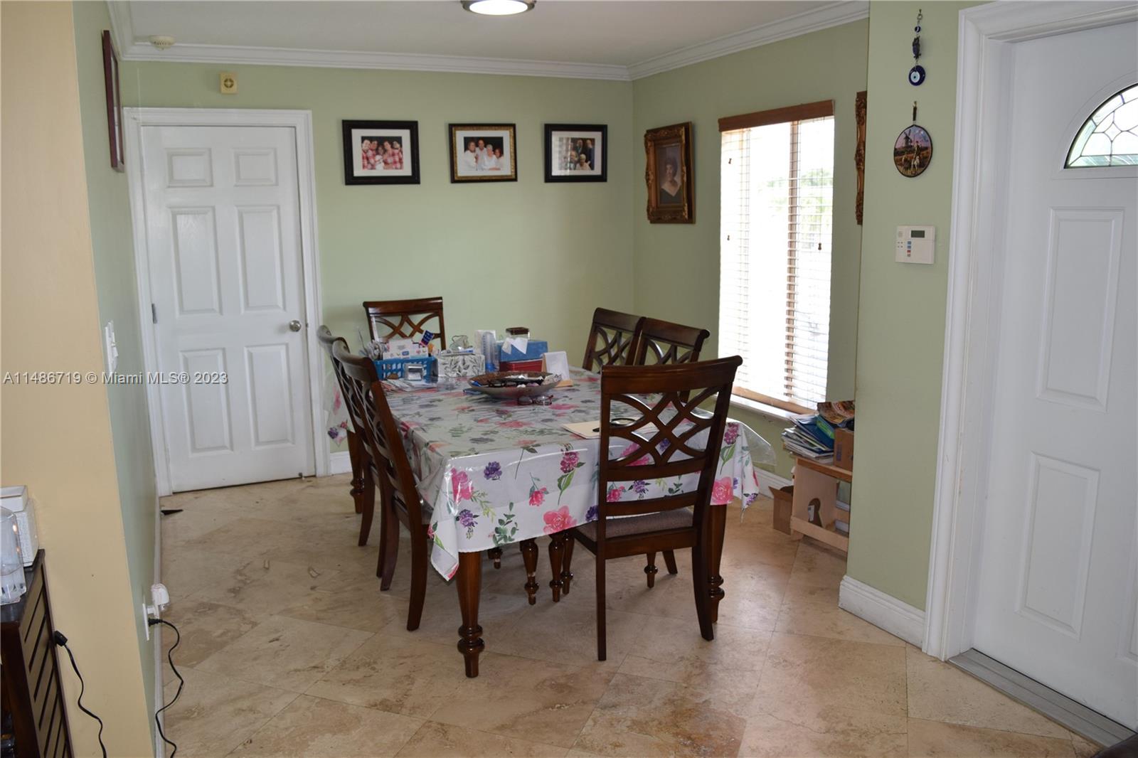Palmetto Estates Miami, FL 33157 - Photo 19 of 20 a dining room with furniture and window