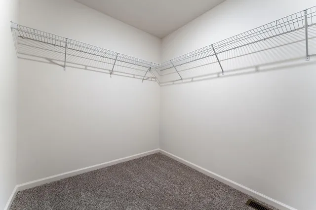 a view of a room with racks on the wall