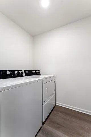 a utility room with dryer and washer