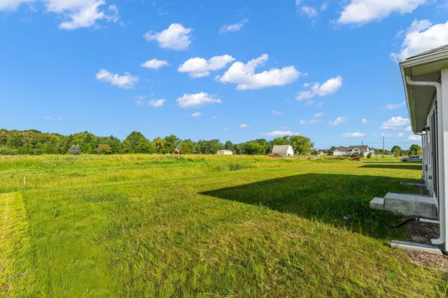 a view of a golf course with a lake