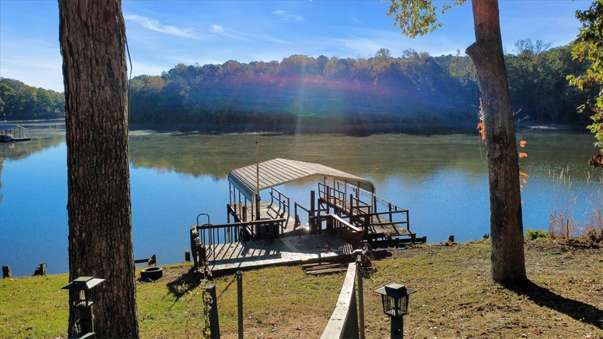 122 Latham Drive Anderson, SC 29621 - Photo 28 of 40 Embrace serene waterfront living with a private dock overlooking the expansive lake.