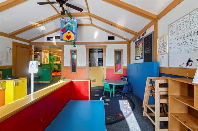 a view of an chairs and table in a patio