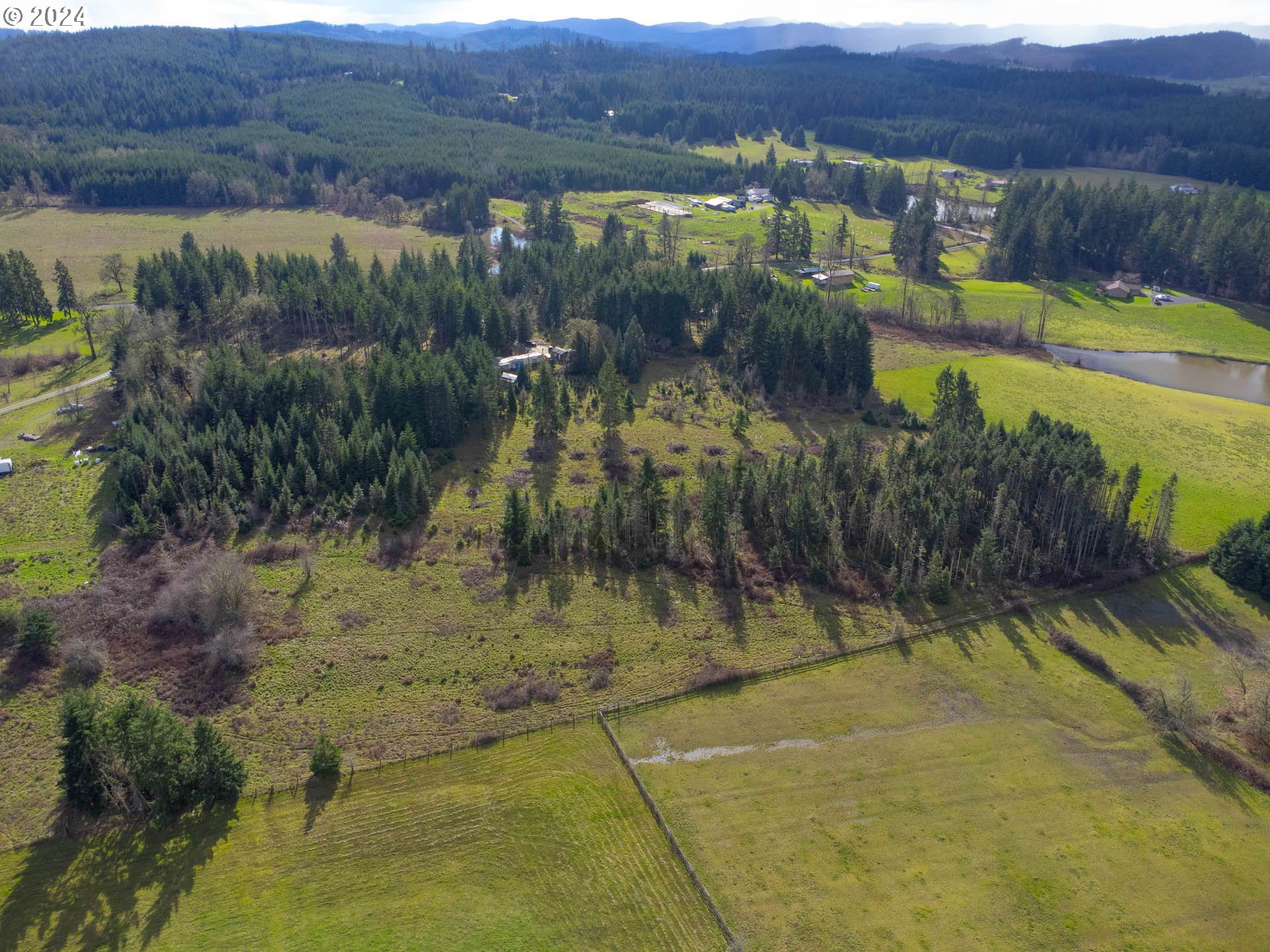 26759 Doble Eugene, OR 97402 - Photo 17 of 19 a view of a lake with a mountain in the background