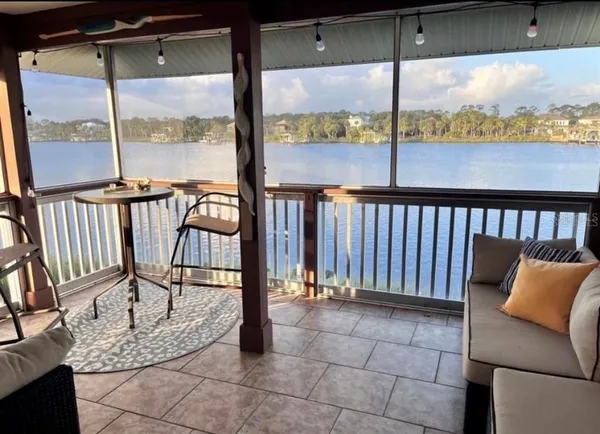 a view of a back yard from a patio