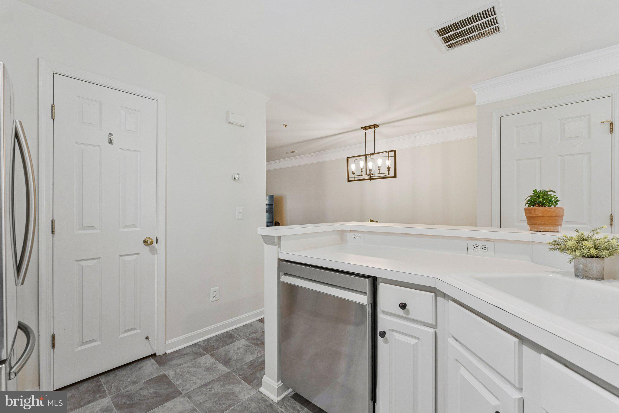 21789 Baldwin Square, Unit 21789 Sterling, VA 20164 - Photo 10 of 33 a bathroom with a sink and vanity