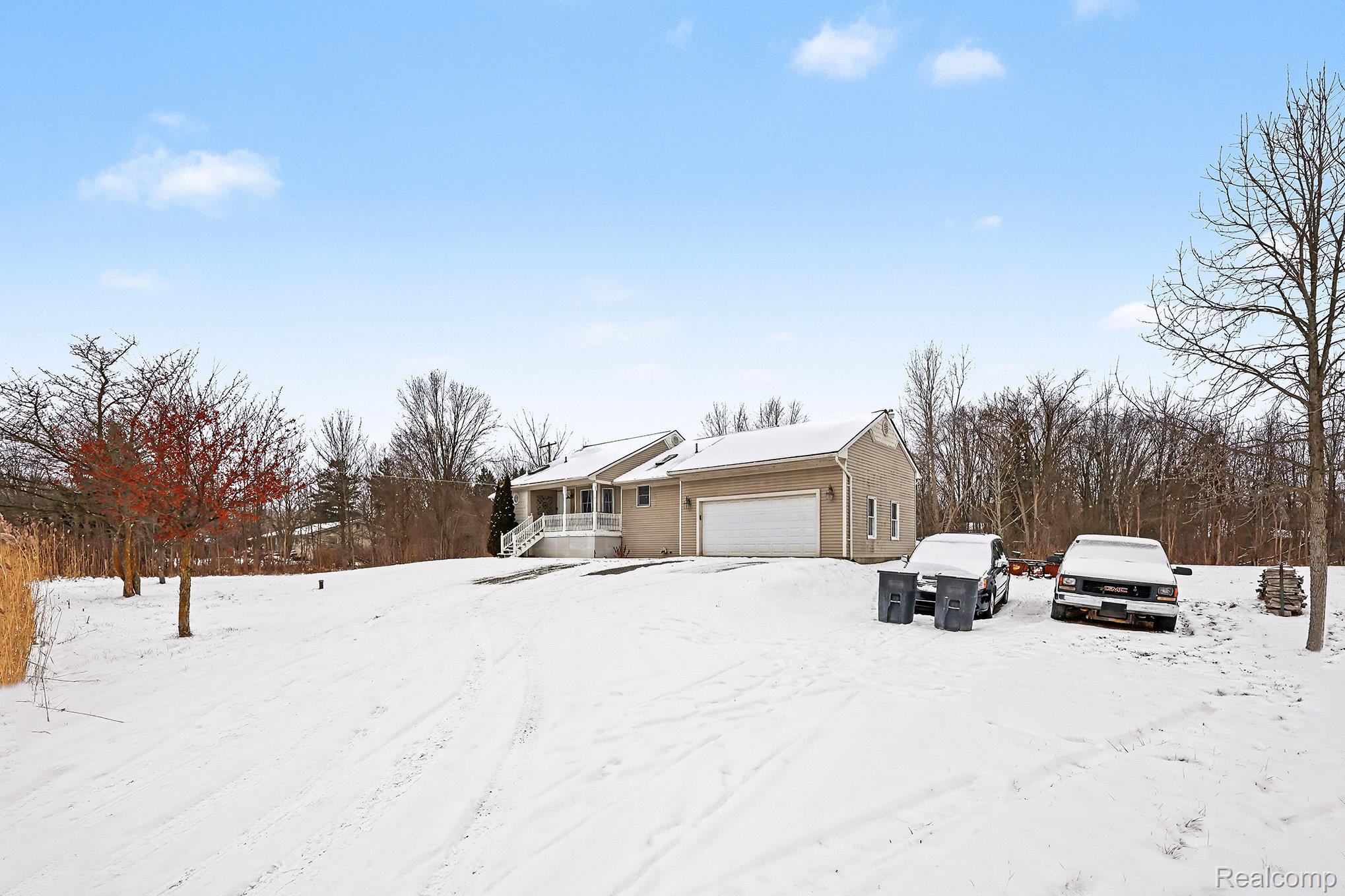 62915 Chubb Road Ray, MI 48096 - Photo 2 of 27 View of front of property featuring an attached garage