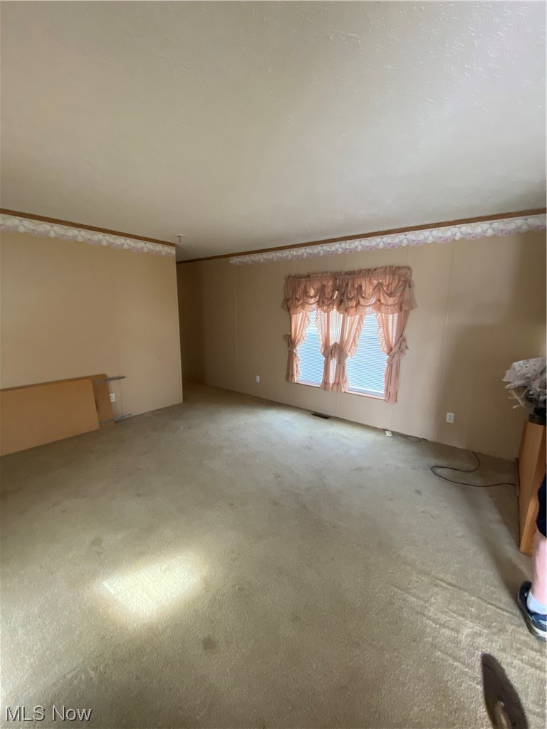 85 Rains Circle Zanesville, OH 43701 - Photo 8 of 15 View of carpeted living room
