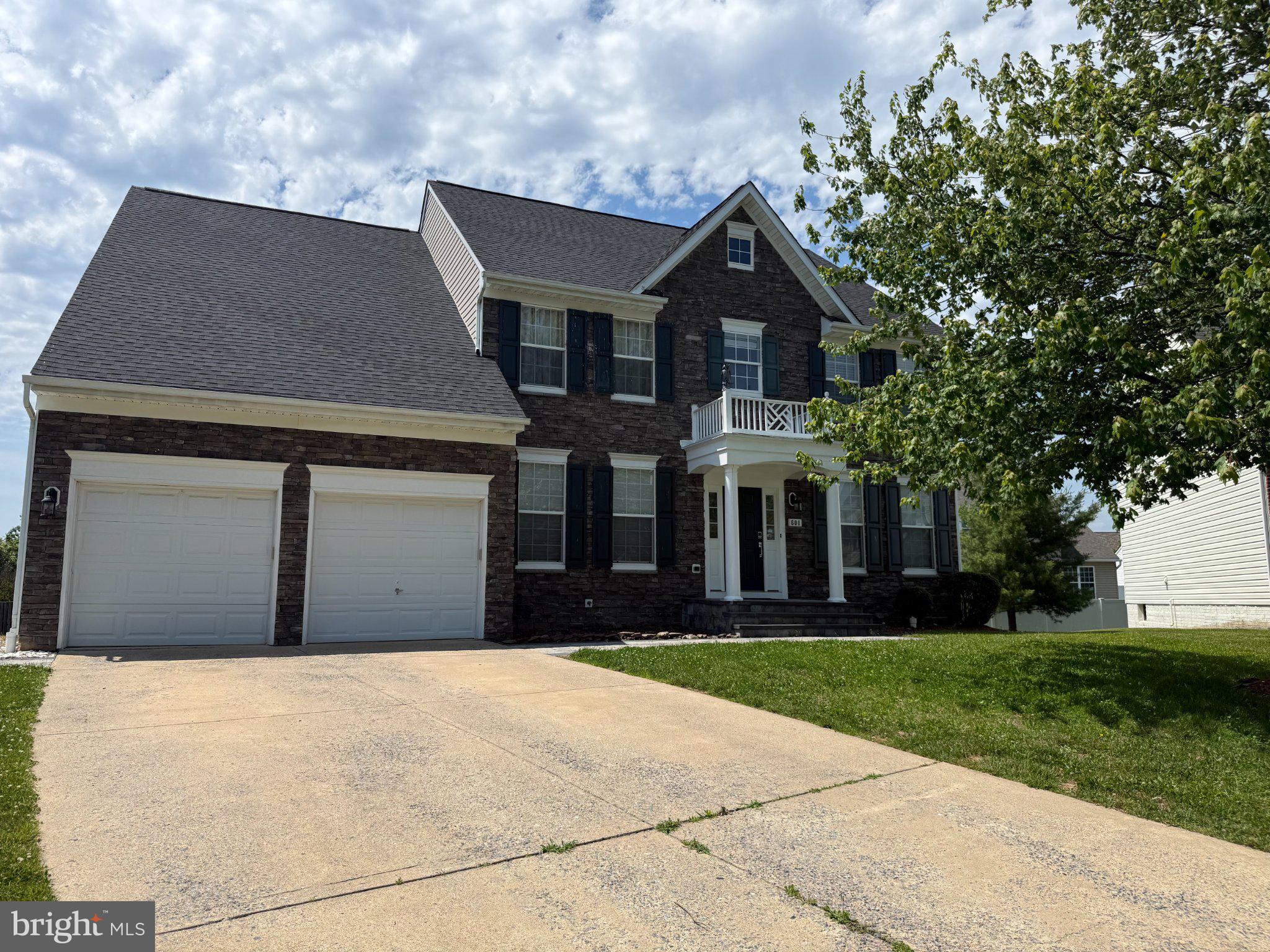 Charming brick home with inviting curb appeal.