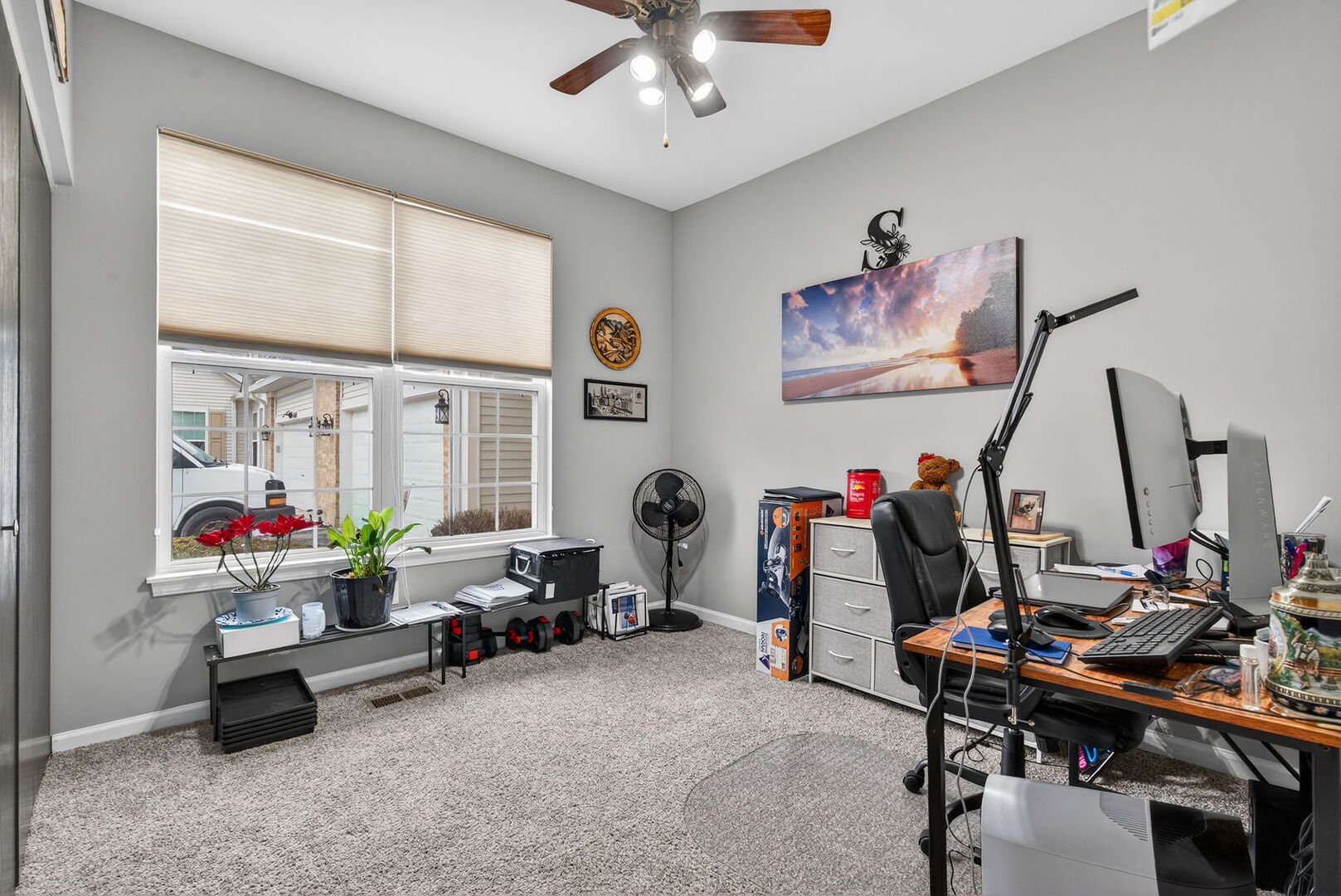 1596 Ludington Circle Romeoville, IL 60446 - Photo 18 of 37 a view of a workspace with furniture and a window