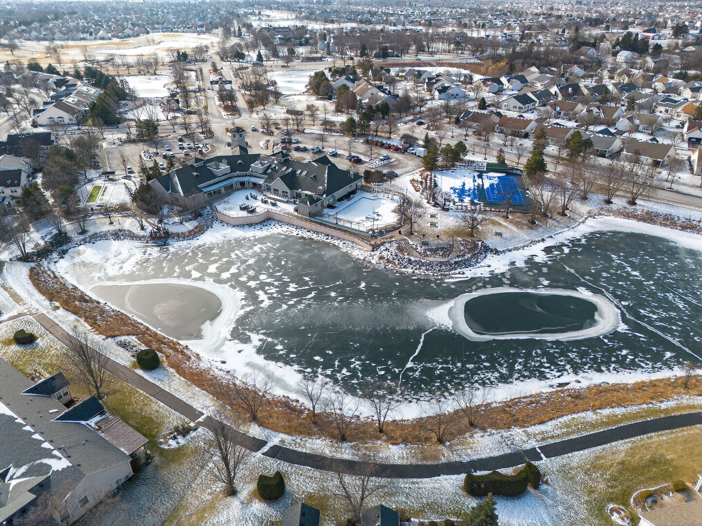 1596 Ludington Circle Romeoville, IL 60446 - Photo 31 of 37 a bathroom with a sink and a mirror