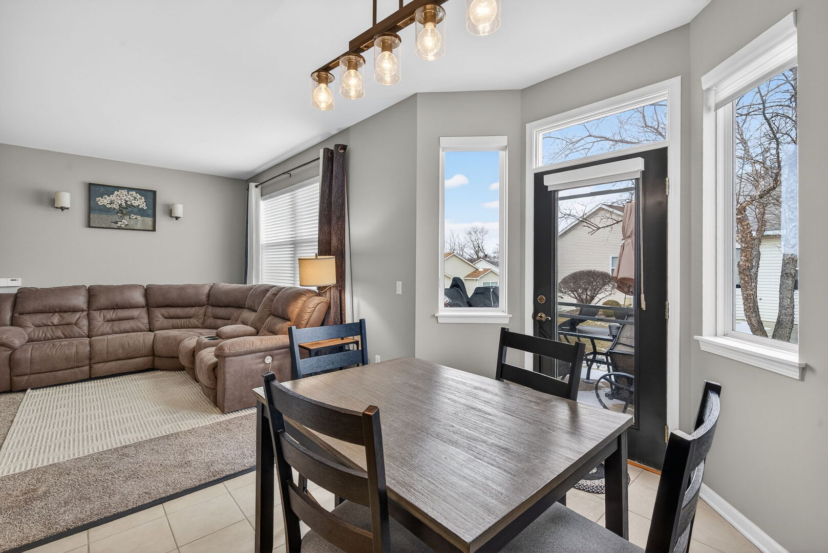 1596 Ludington Circle Romeoville, IL 60446 - Photo 9 of 37 a living room with furniture and wooden floor