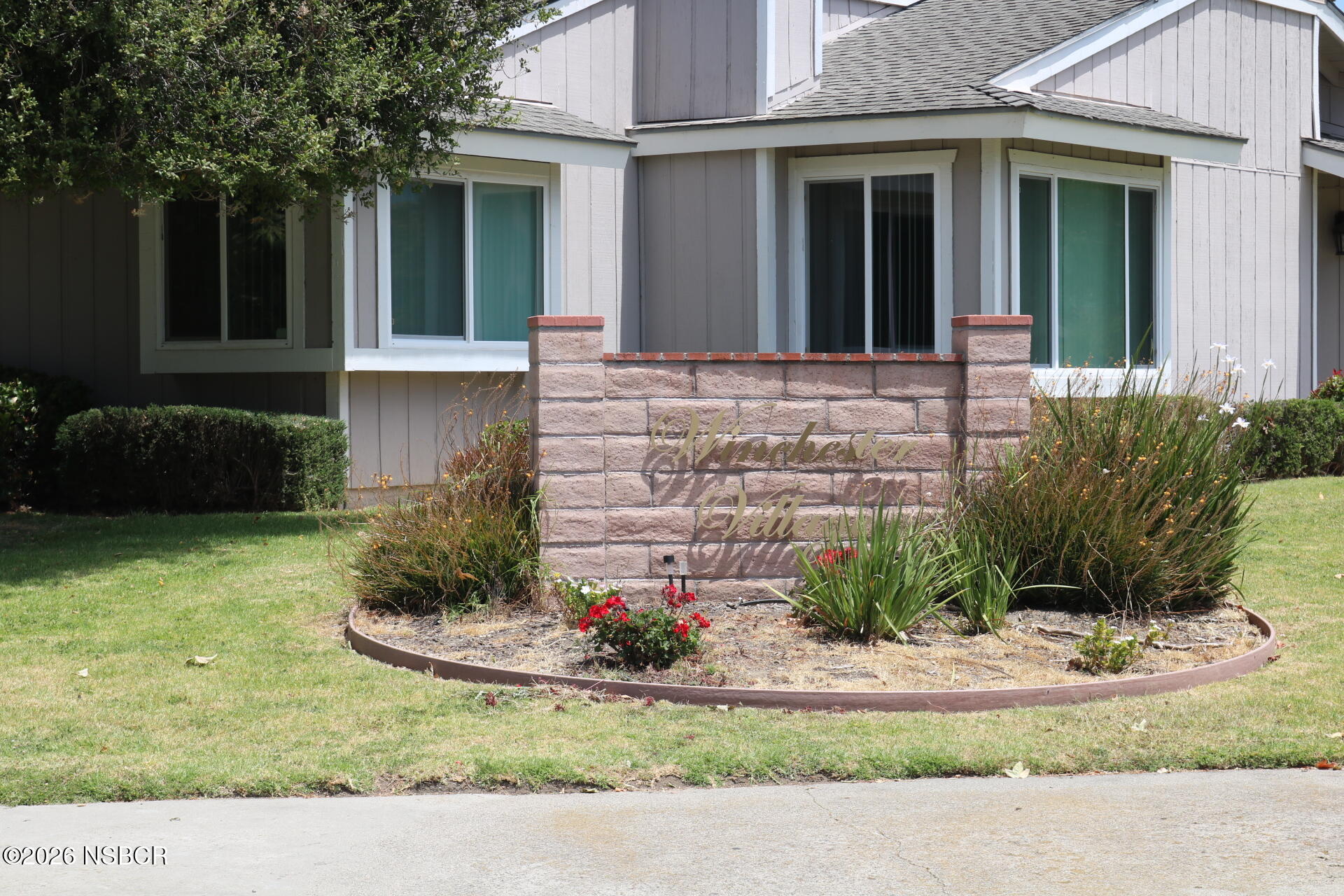 208 North R Street Lompoc, CA 93436 - Photo 4 of 22 a view of a house with a yard