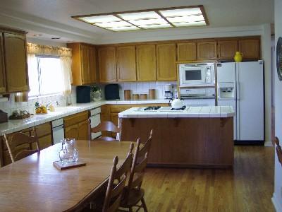 1129 Kidd Road Windsor, CA 95492 - Photo 11 of 11 a kitchen with a sink cabinets and window