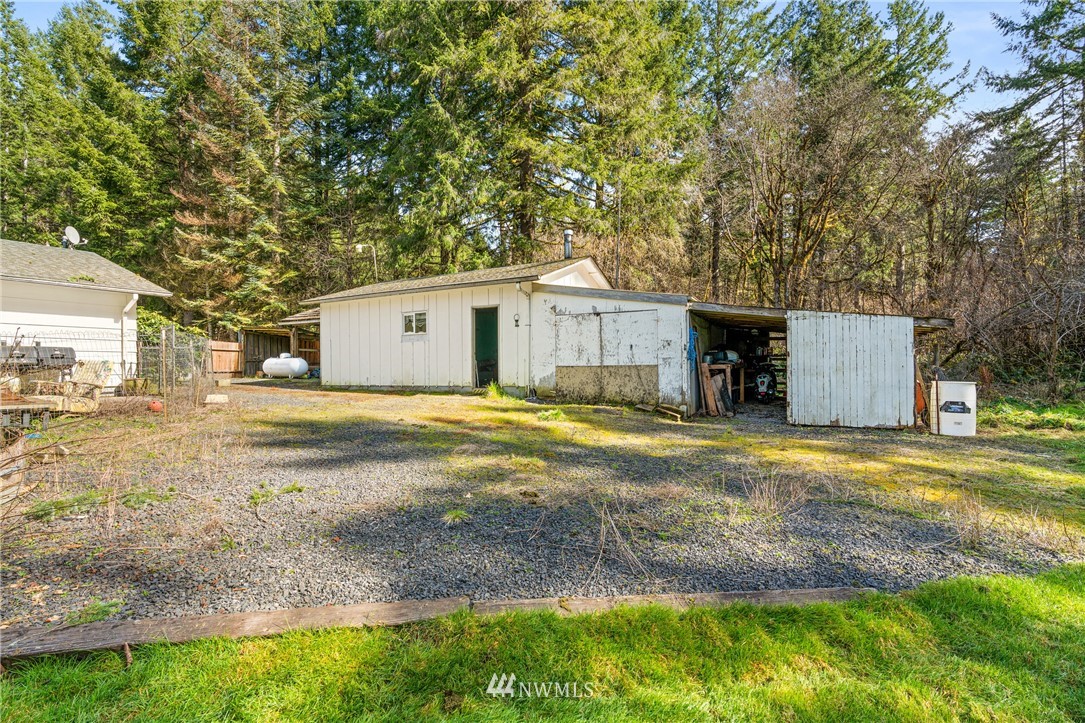 187 Limmer Road Winlock, WA 98596 - Photo 17 of 17 a front view of a house with a yard and garage