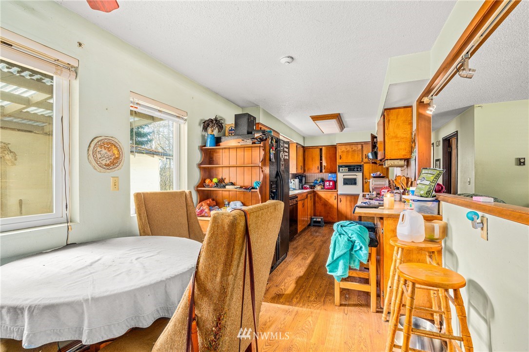 187 Limmer Road Winlock, WA 98596 - Photo 6 of 17 a living room filled with furniture and a large window