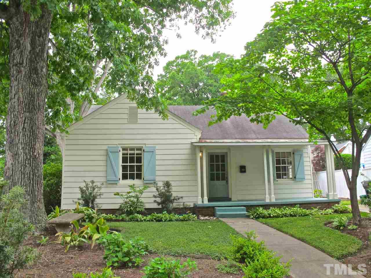 1607 Carson Street Raleigh, NC 27608 - Photo 1 of 16 a front view of a house with a garden