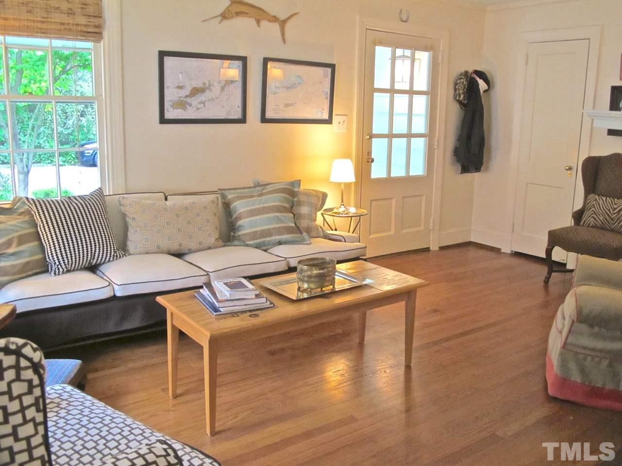 1607 Carson Street Raleigh, NC 27608 - Photo 3 of 16 a living room with furniture and a window
