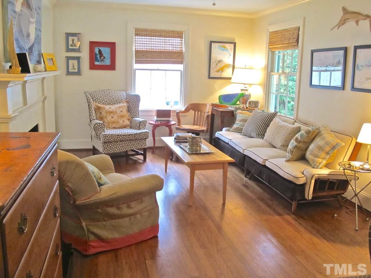 1607 Carson Street Raleigh, NC 27608 - Photo 4 of 16 a living room with furniture and a wooden floor