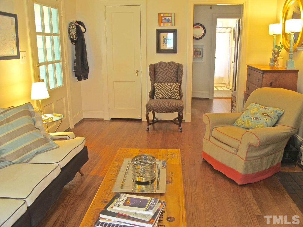 1607 Carson Street Raleigh, NC 27608 - Photo 6 of 16 a living room with furniture and a wooden floor