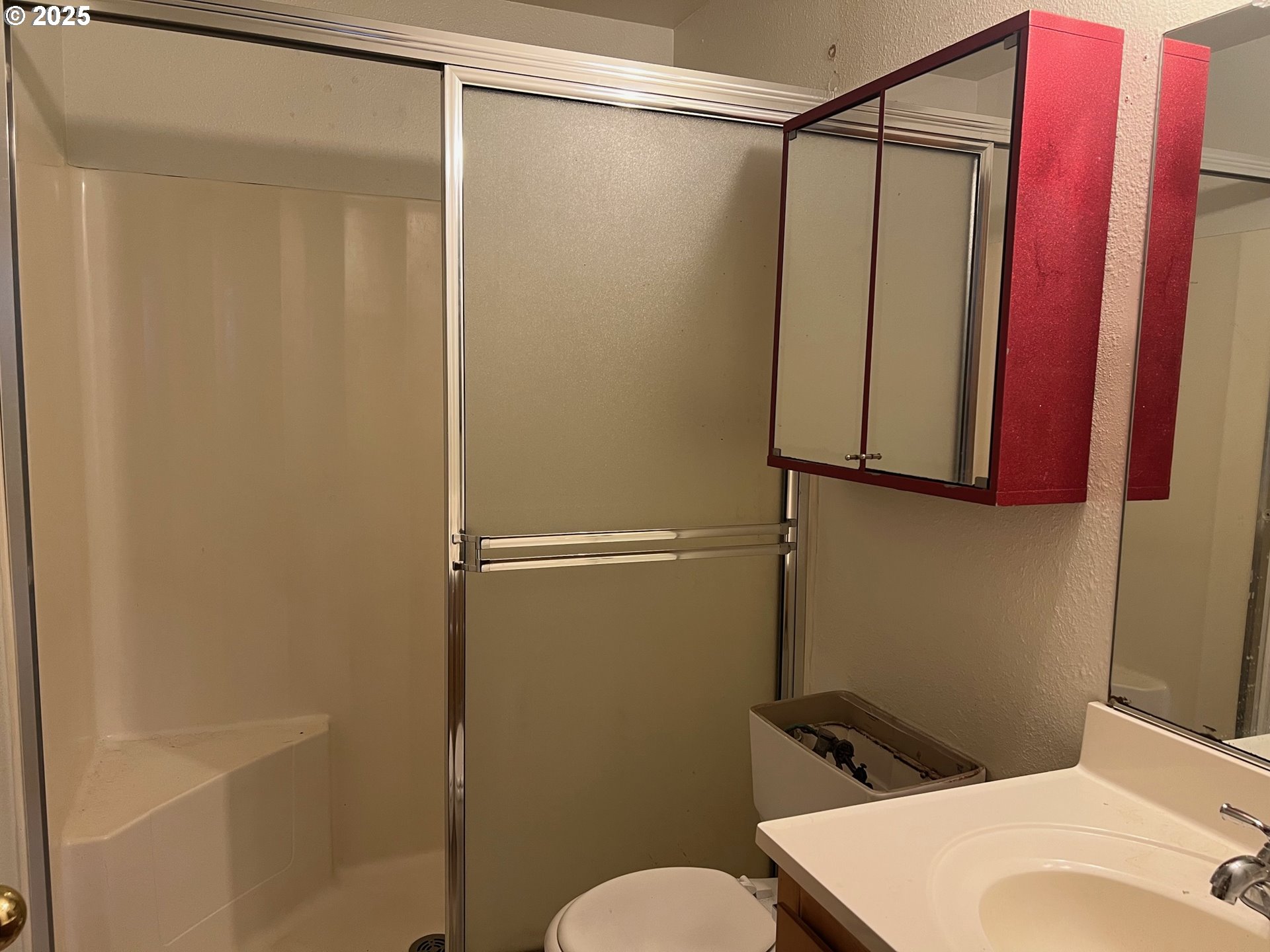 18830 Southwest Butternut Street Beaverton, OR 97078 - Photo 10 of 13 a bathroom with a shower and a toilet