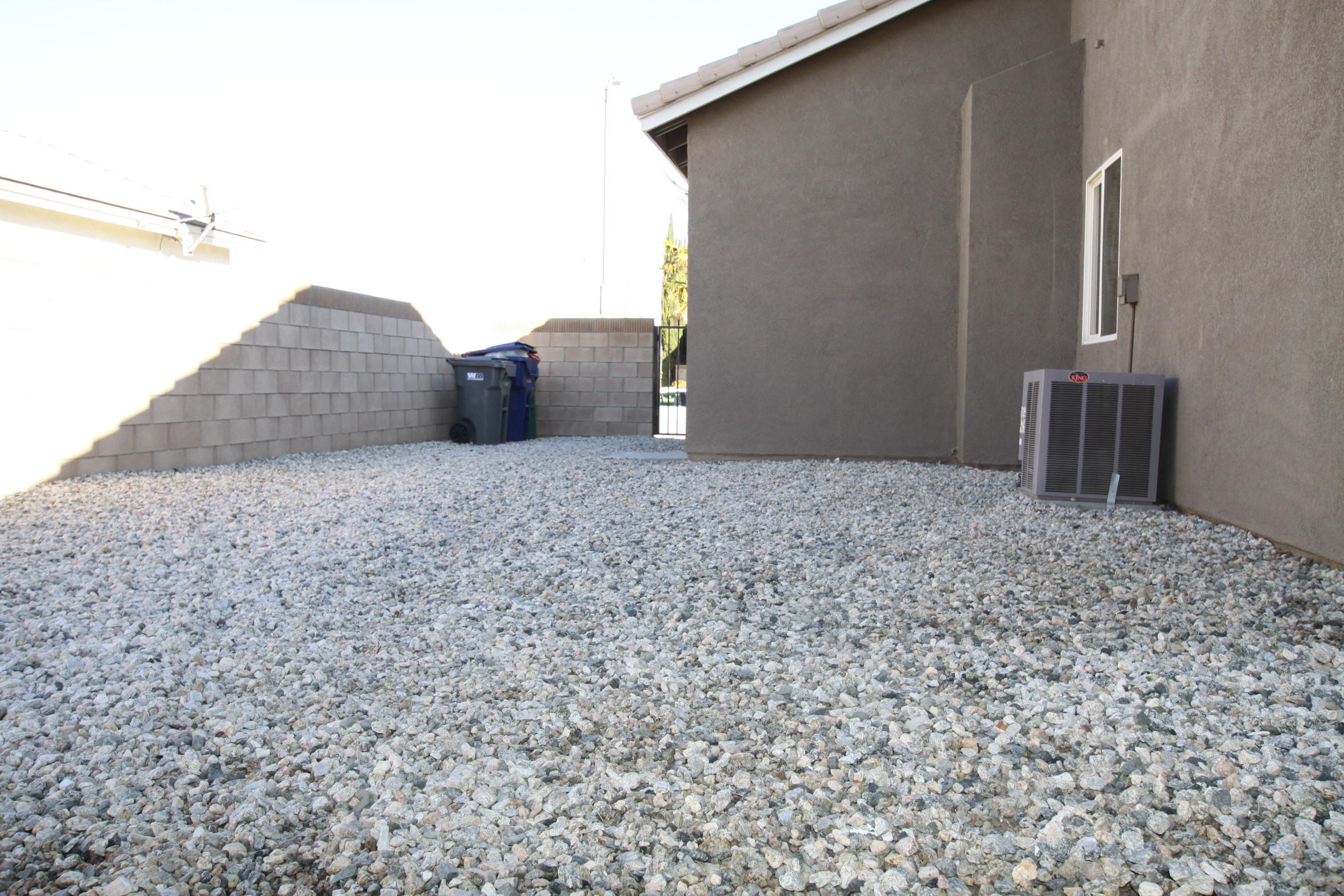 2104 Avenue J7 W Lancaster Ca West Lancaster, CA 93536 - Photo 18 of 18 a backyard of a house