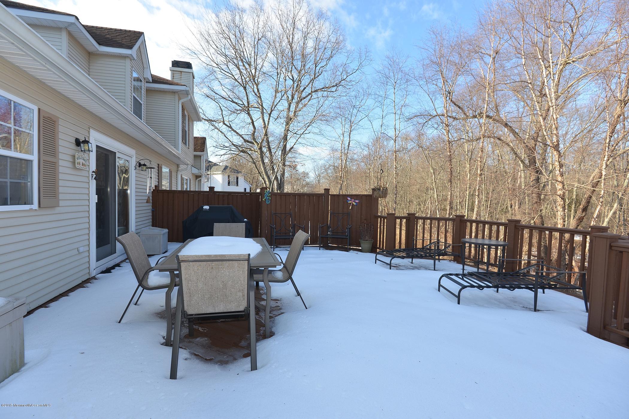 81 Racquet Road Wall, NJ 07719 - Photo 25 of 28 Deck wooded view