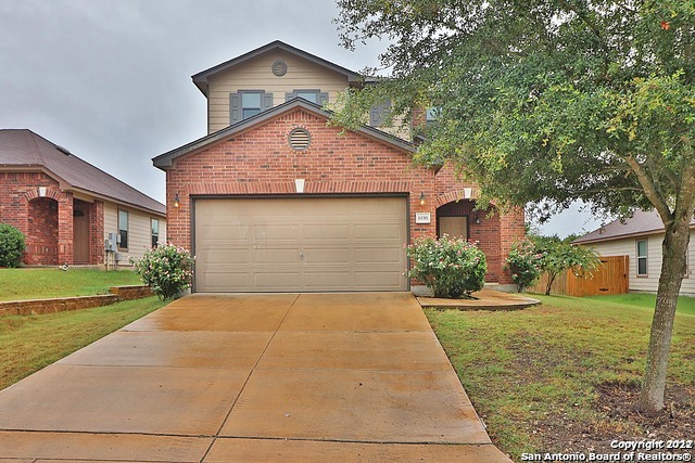 6116 Fred Couples Schertz, TX 78108 - Photo 1 of 1 a front view of a house with a yard