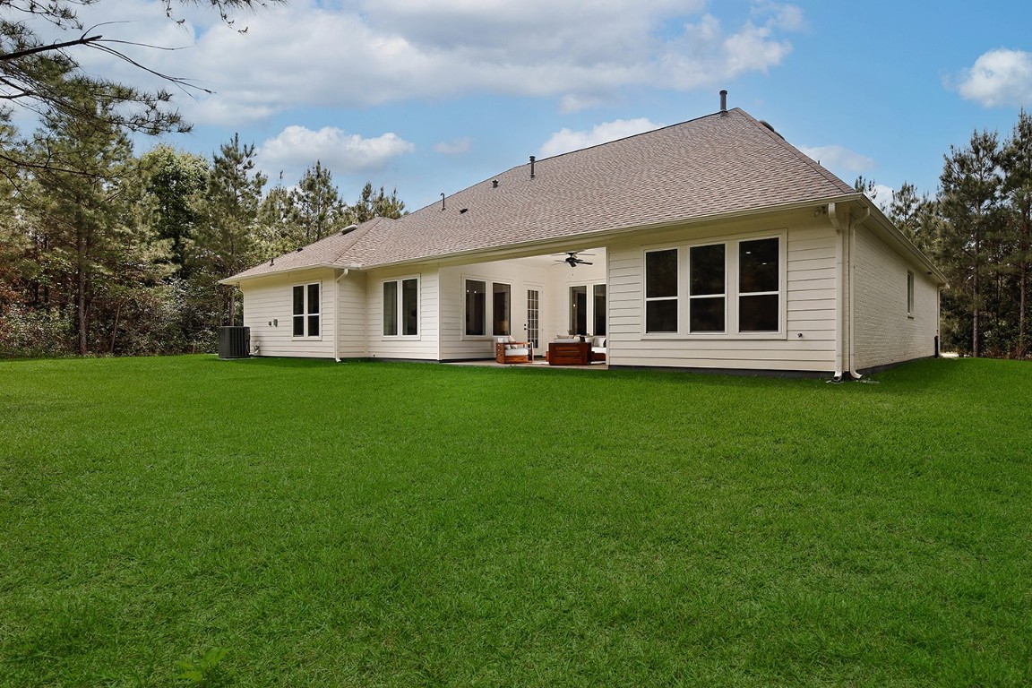 11709 Grand N Road Willis, TX 77378 - Photo 31 of 37 Room for a pool, garden, play equipment and outdoor games.