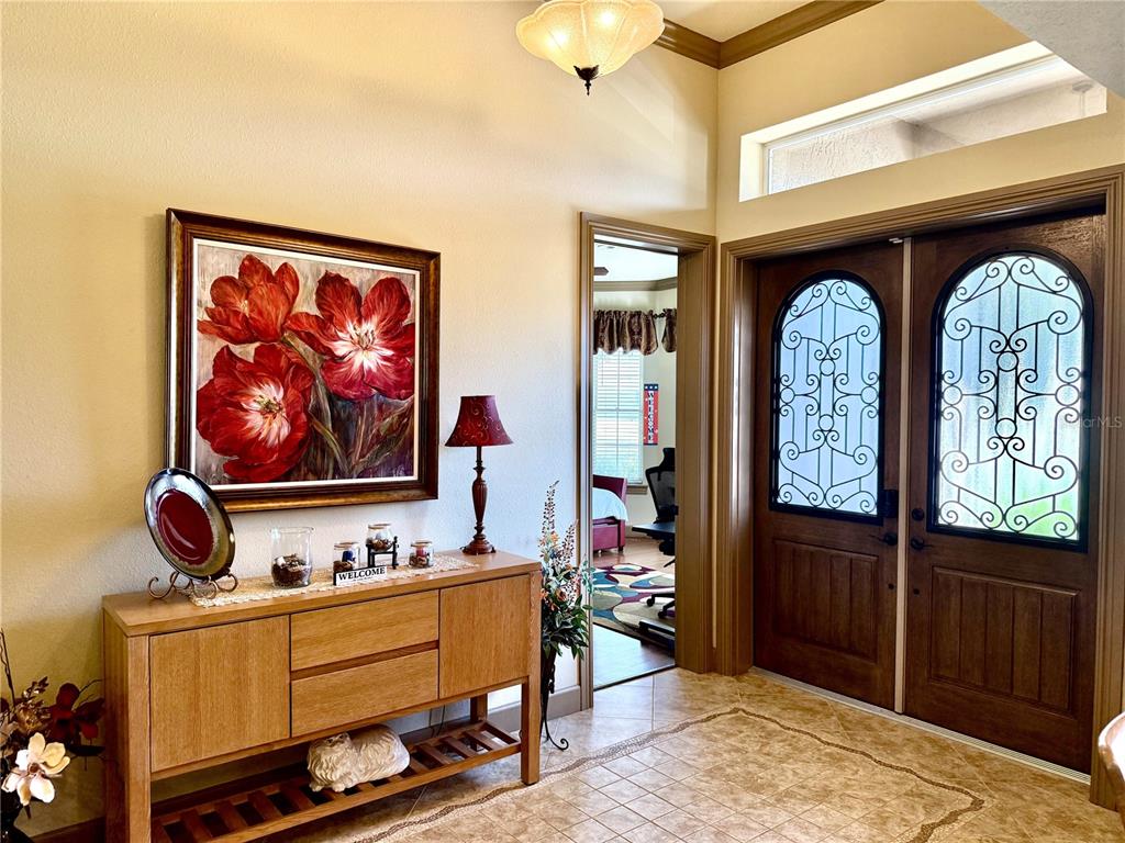 6656 Southwest 179th Ave Road Dunnellon, FL 34432 - Photo 16 of 43 a front view of a house with garden