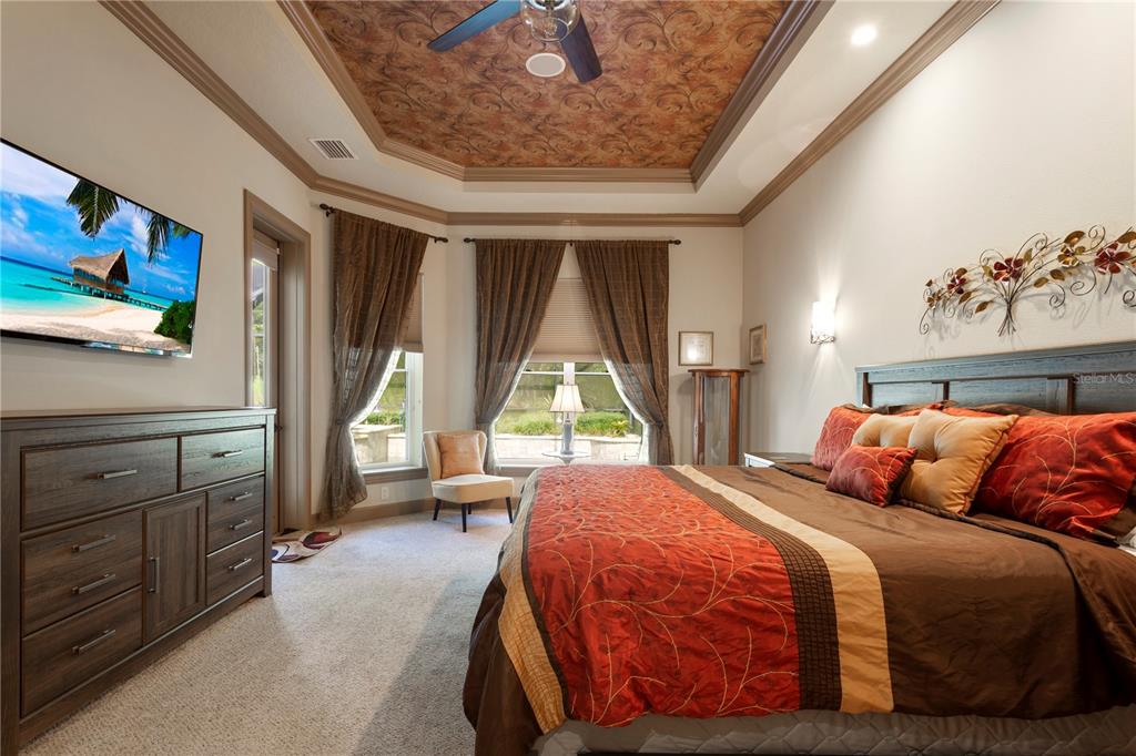 6656 Southwest 179th Ave Road Dunnellon, FL 34432 - Photo 17 of 43 a bedroom with a bed and a window