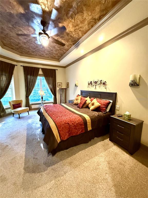 6656 Southwest 179th Ave Road Dunnellon, FL 34432 - Photo 18 of 43 a bedroom with a bed and wooden floor