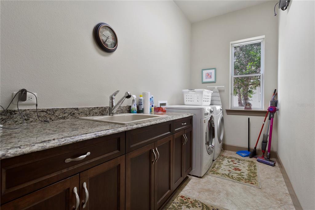 6656 Southwest 179th Ave Road Dunnellon, FL 34432 - Photo 30 of 43 a kitchen with a sink and a stove