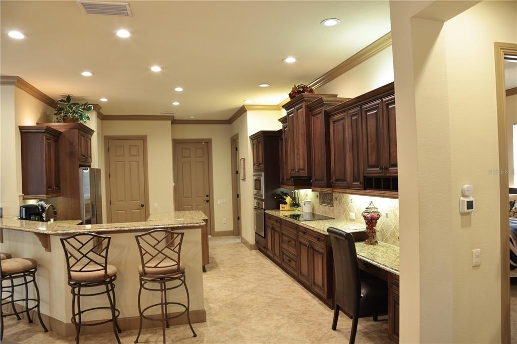 6656 Southwest 179th Ave Road Dunnellon, FL 34432 - Photo 3 of 43 a bathroom with a sink a mirror and a shower