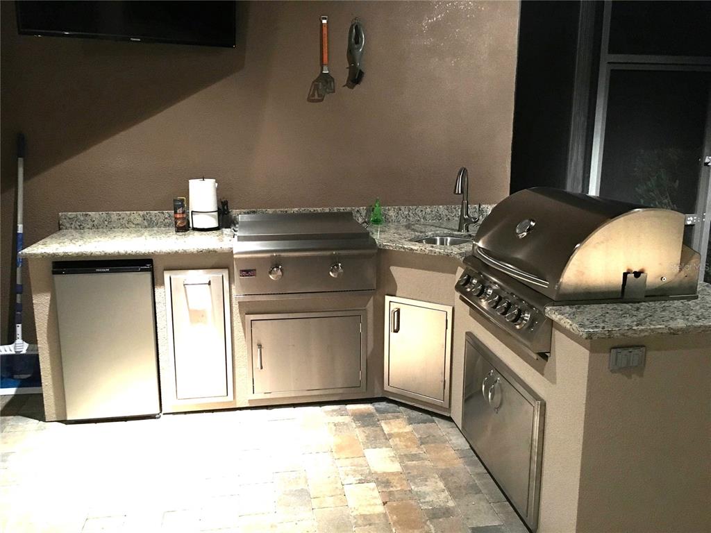 6656 Southwest 179th Ave Road Dunnellon, FL 34432 - Photo 37 of 43 a kitchen with a stove and a sink