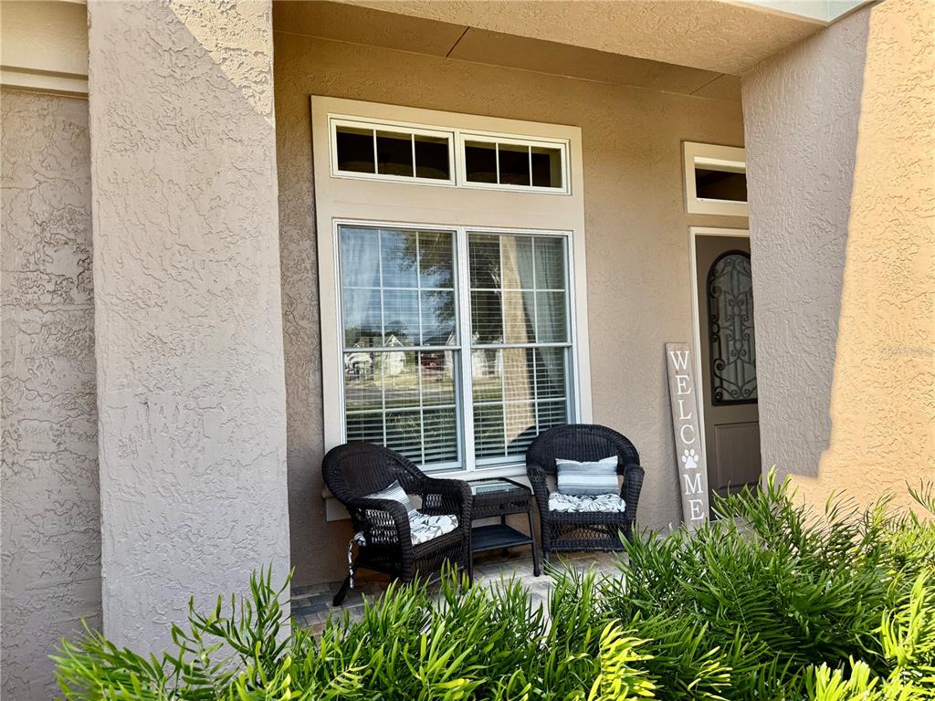6656 Southwest 179th Ave Road Dunnellon, FL 34432 - Photo 39 of 43 a living room with a couch and potted plant