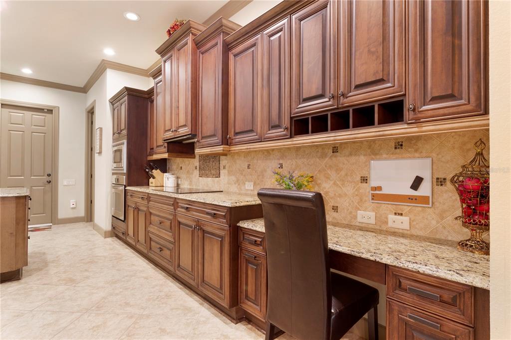 6656 Southwest 179th Ave Road Dunnellon, FL 34432 - Photo 4 of 43 a kitchen with stainless steel appliances granite countertop a refrigerator and cabinets