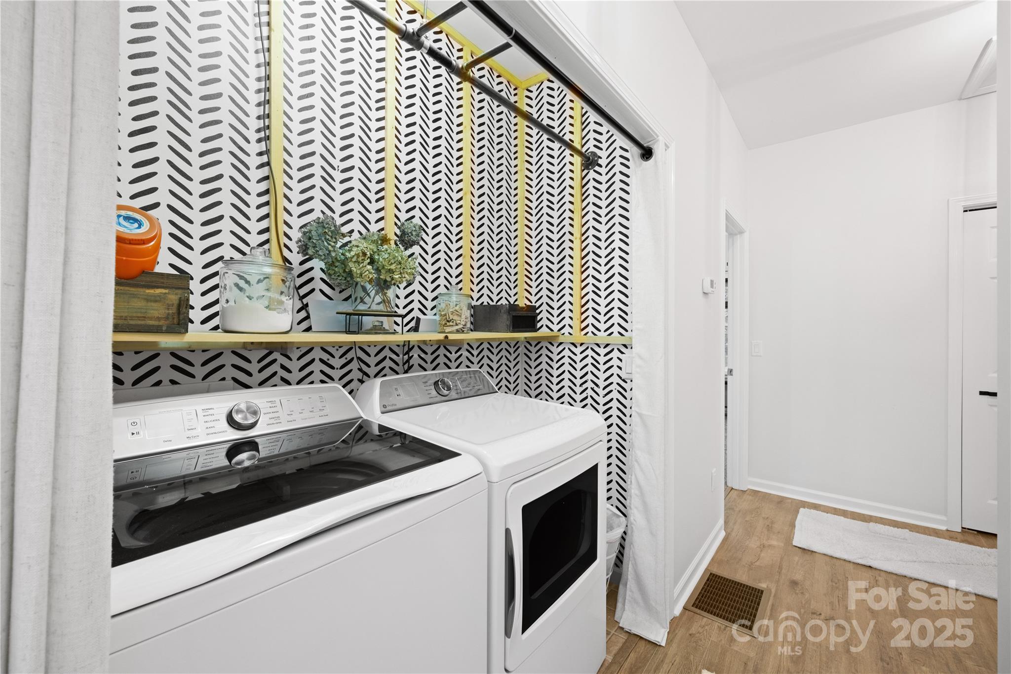 1308 Bell Mountain Road Zirconia, NC 28790 - Photo 13 of 42 a utility room with dryer and washer