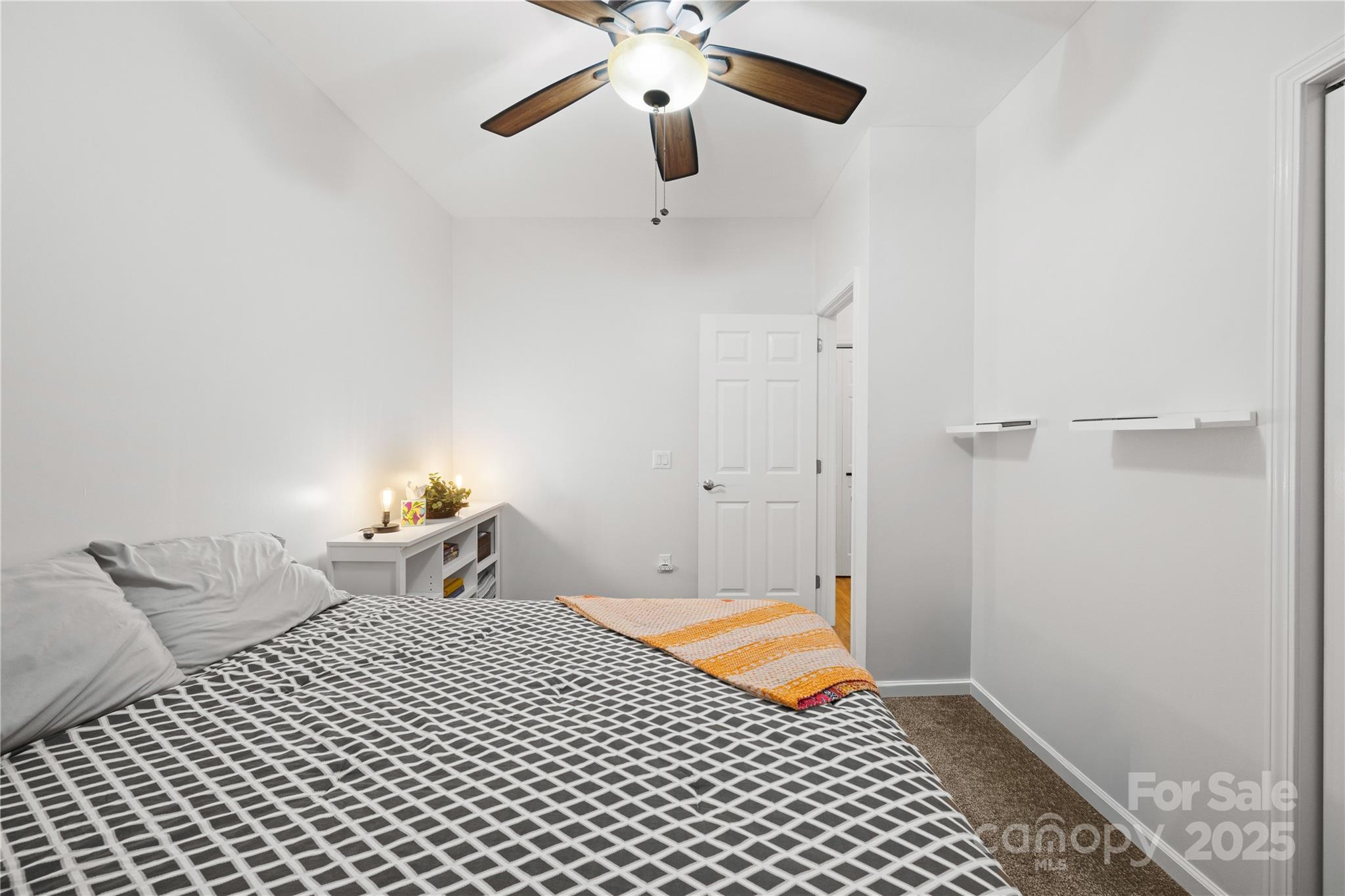 1308 Bell Mountain Road Zirconia, NC 28790 - Photo 17 of 42 a bedroom with bed and window