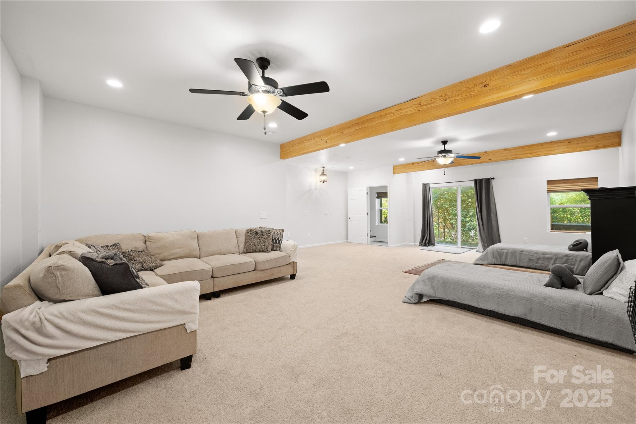 1308 Bell Mountain Road Zirconia, NC 28790 - Photo 27 of 42 a living room with furniture and a large window