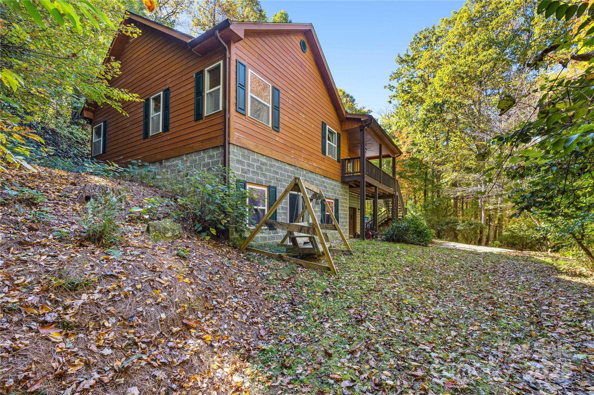 1308 Bell Mountain Road Zirconia, NC 28790 - Photo 34 of 42 a front view of a house with a yard