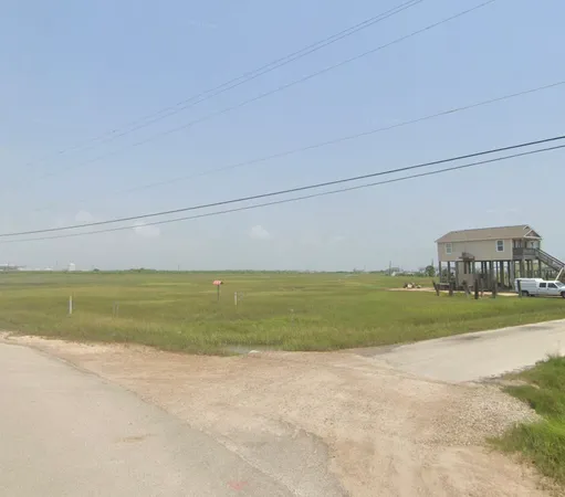 a view of a house with a yard and a big yard