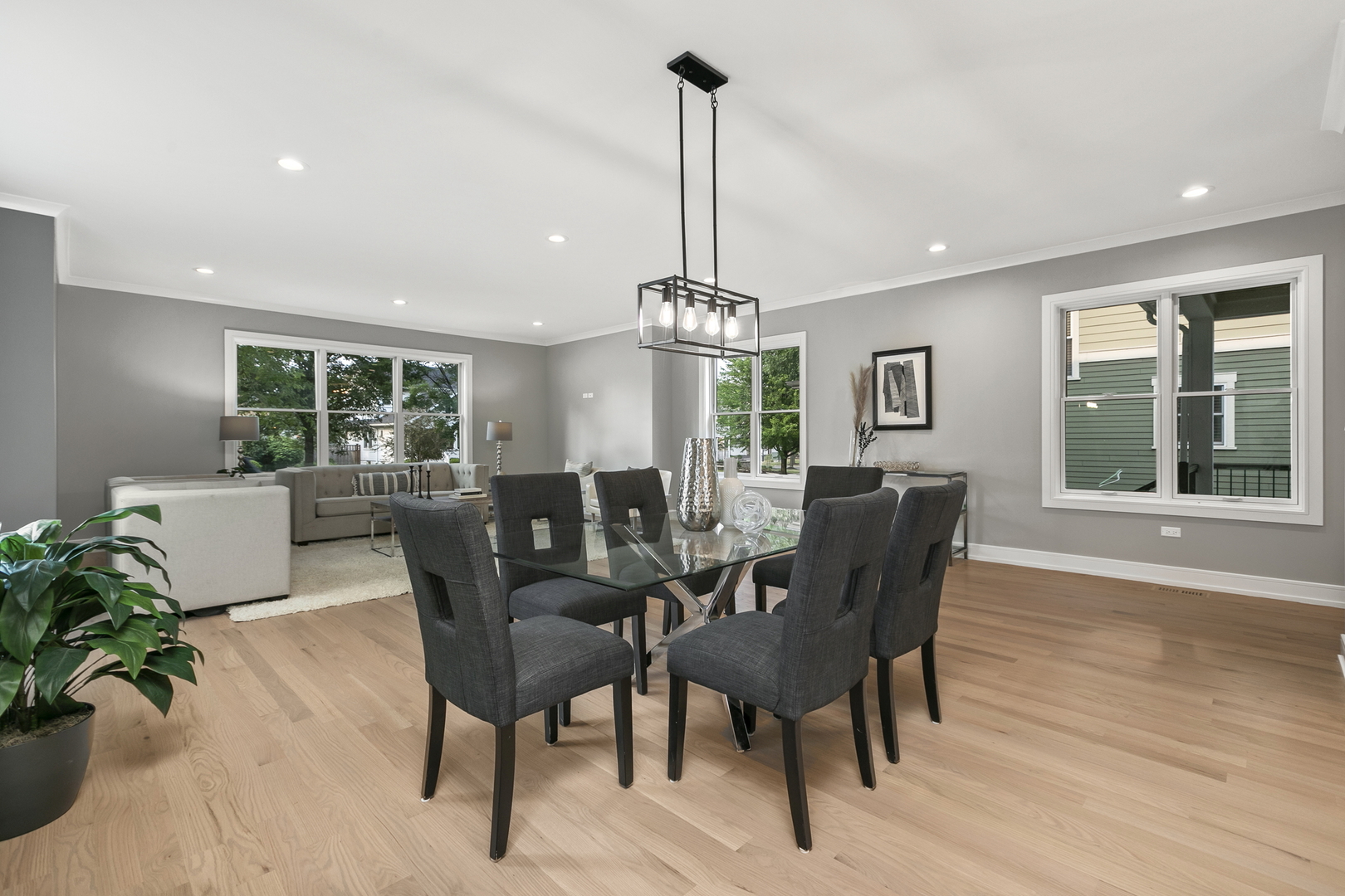 220 Spring Avenue Naperville, IL 60540 - Photo 16 of 52 a view of a dining room with furniture window and wooden floor