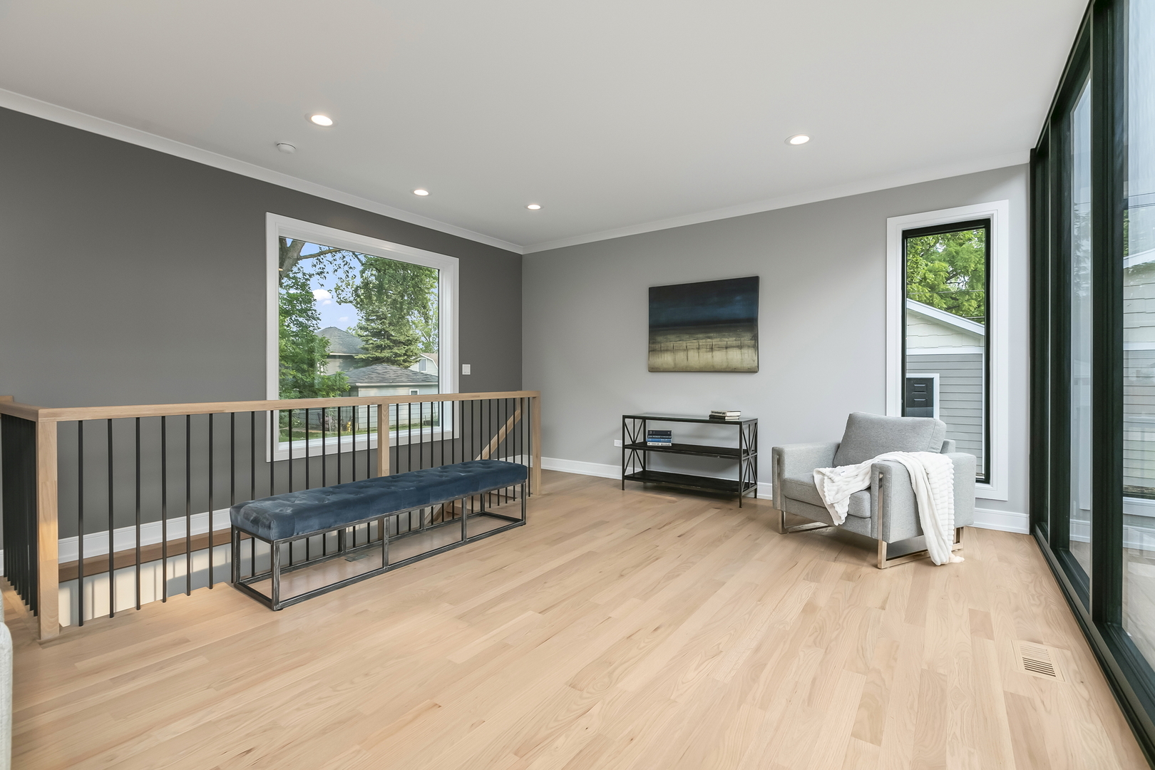 220 Spring Avenue Naperville, IL 60540 - Photo 20 of 52 a view of a room with wooden floor and windows