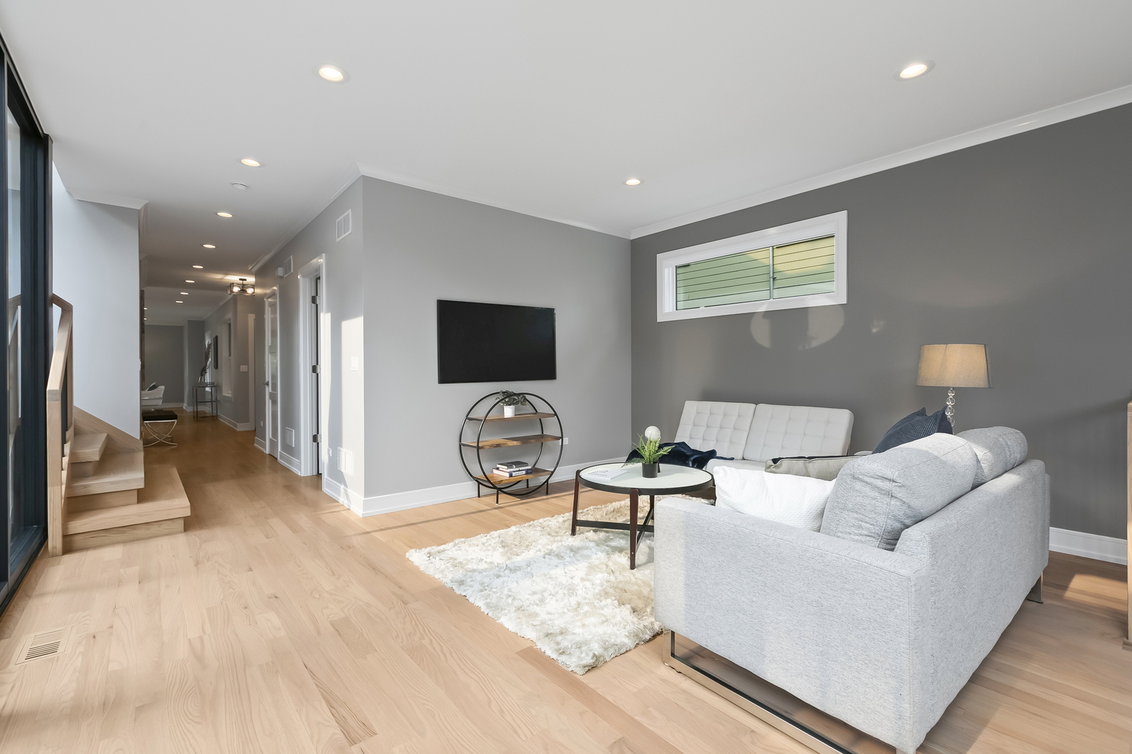 220 Spring Avenue Naperville, IL 60540 - Photo 22 of 52 a living room with furniture and a flat screen tv