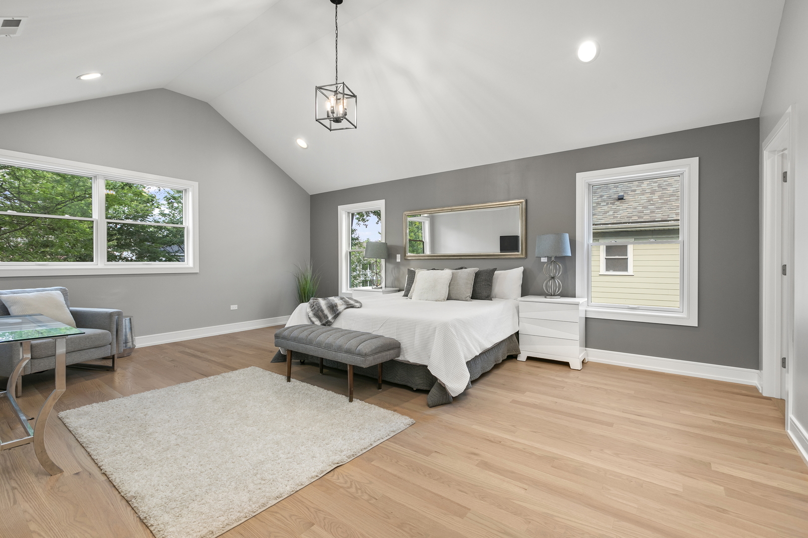 220 Spring Avenue Naperville, IL 60540 - Photo 28 of 52 a bedroom with a large bed and a window