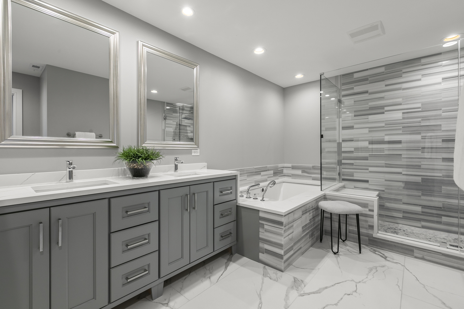 220 Spring Avenue Naperville, IL 60540 - Photo 32 of 52 a bathroom with a sink and a mirror
