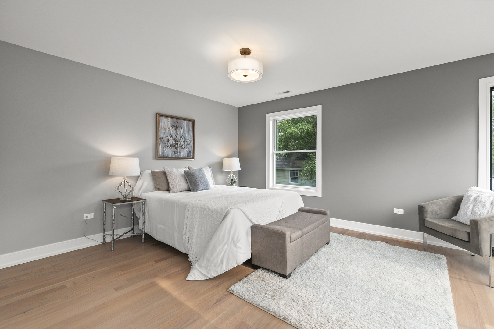 220 Spring Avenue Naperville, IL 60540 - Photo 39 of 52 a spacious bedroom with a bed and window