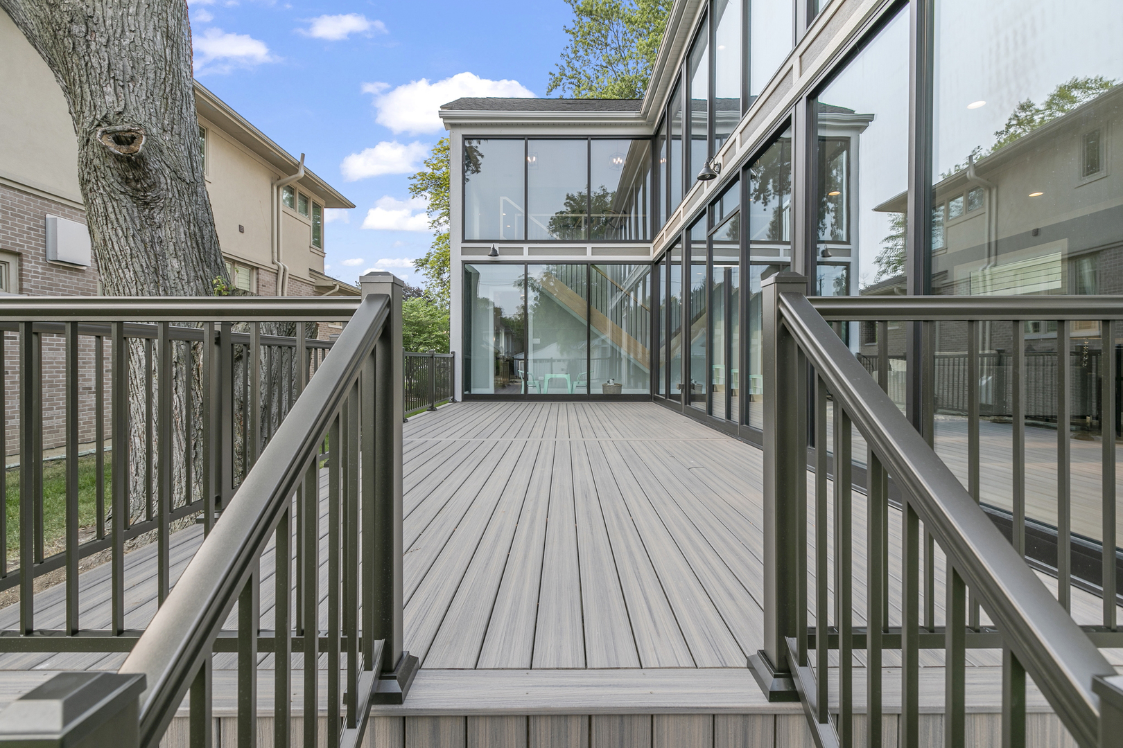 220 Spring Avenue Naperville, IL 60540 - Photo 48 of 52 a view of balcony with wooden floor and wooden fence