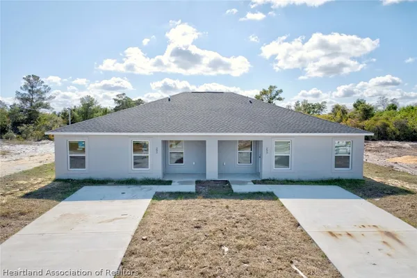 a front view of house with yard