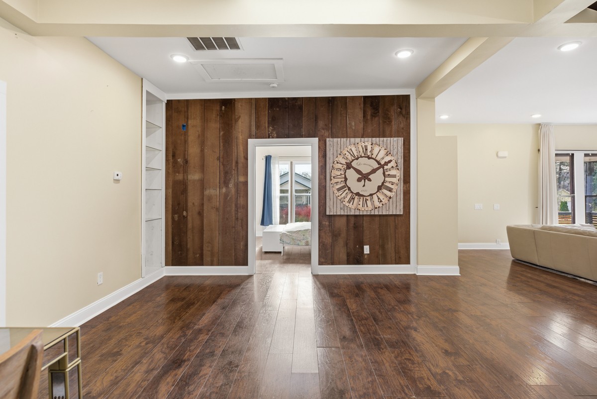 107 East Ward Street Centerville, TN 37033 - Photo 12 of 34 a view of a hallway with wooden floor and windows